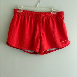 Nike Women's orange Athletic Running Shorts with Small Swoosh